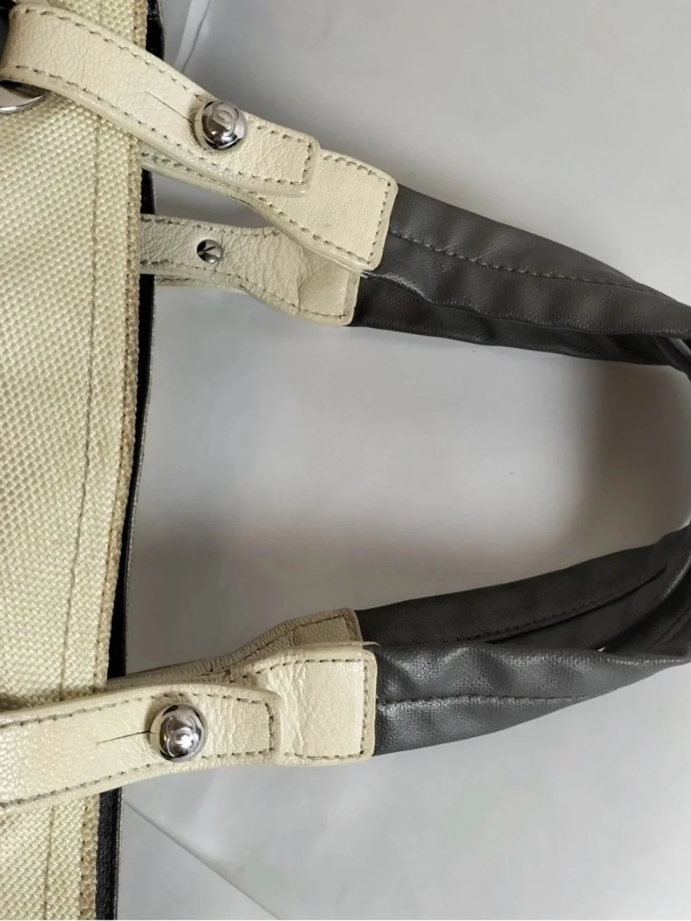 CHANEL Quilted Metallic Black Tote with Cream Accents